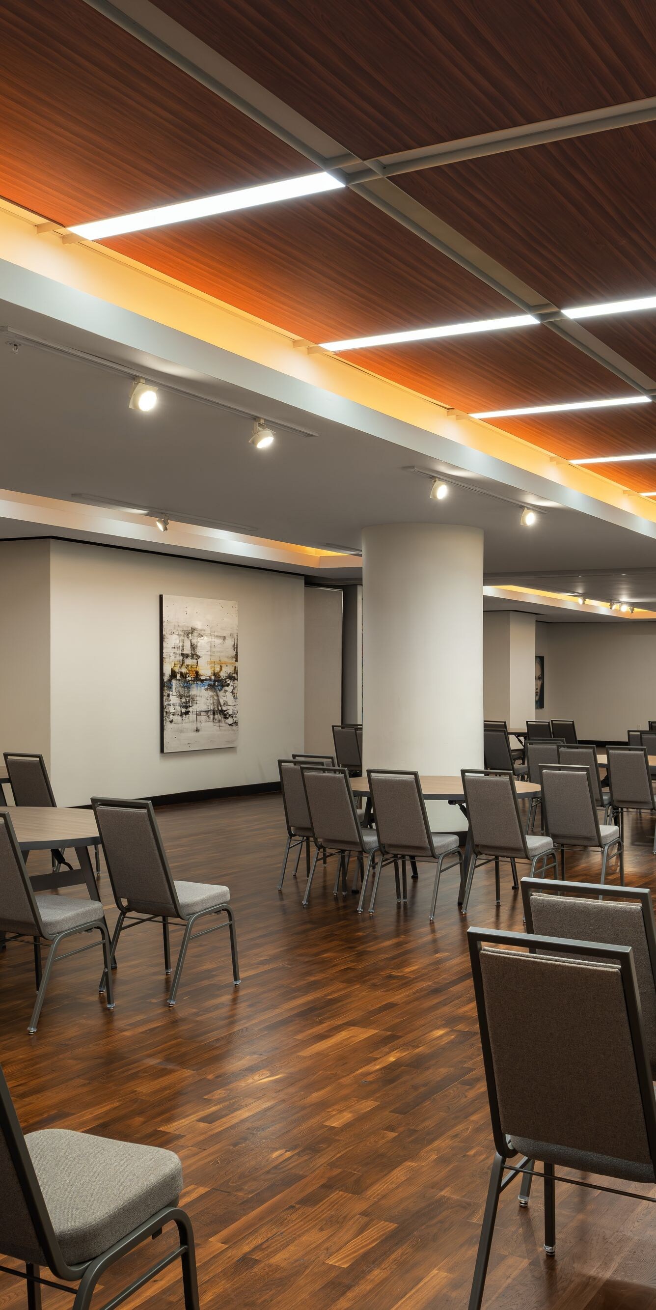 Ballroom with round tables and art