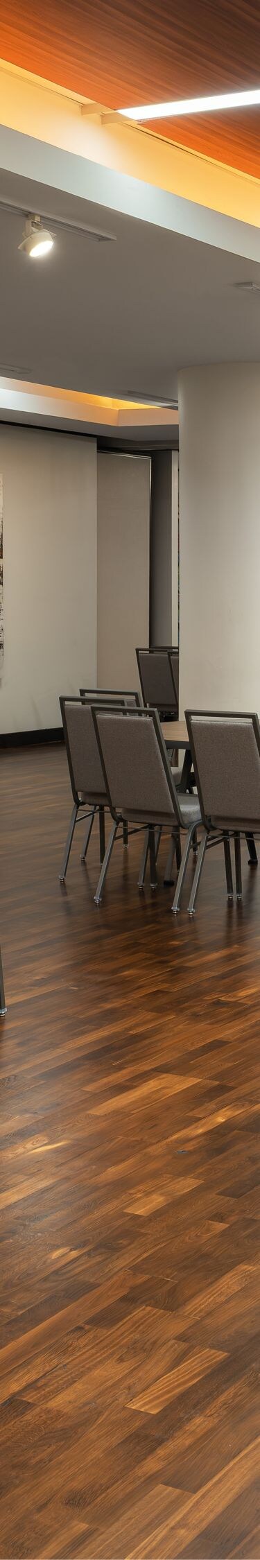 Ballroom with round tables and art