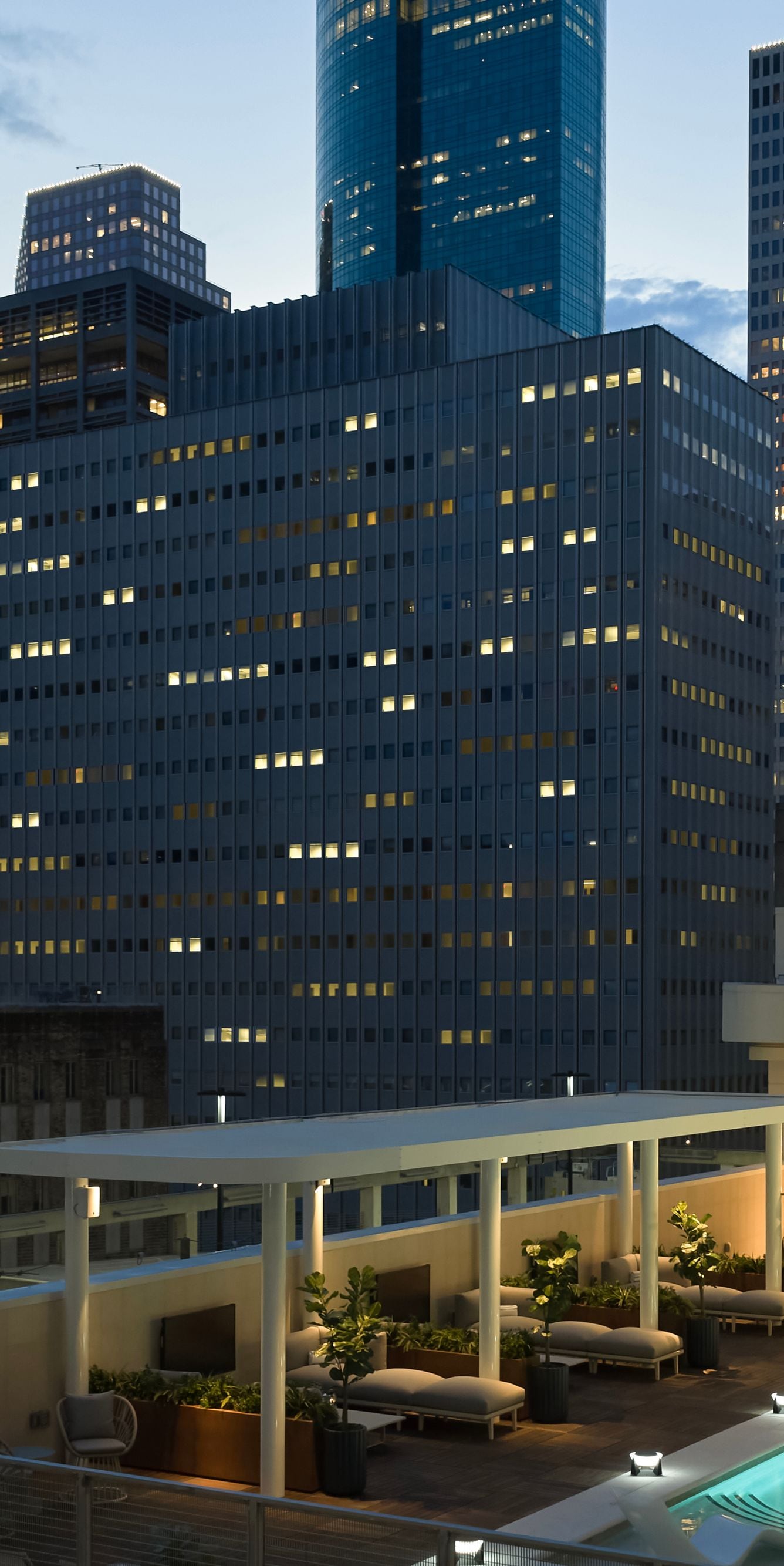 Rooftop pool with city skyline view