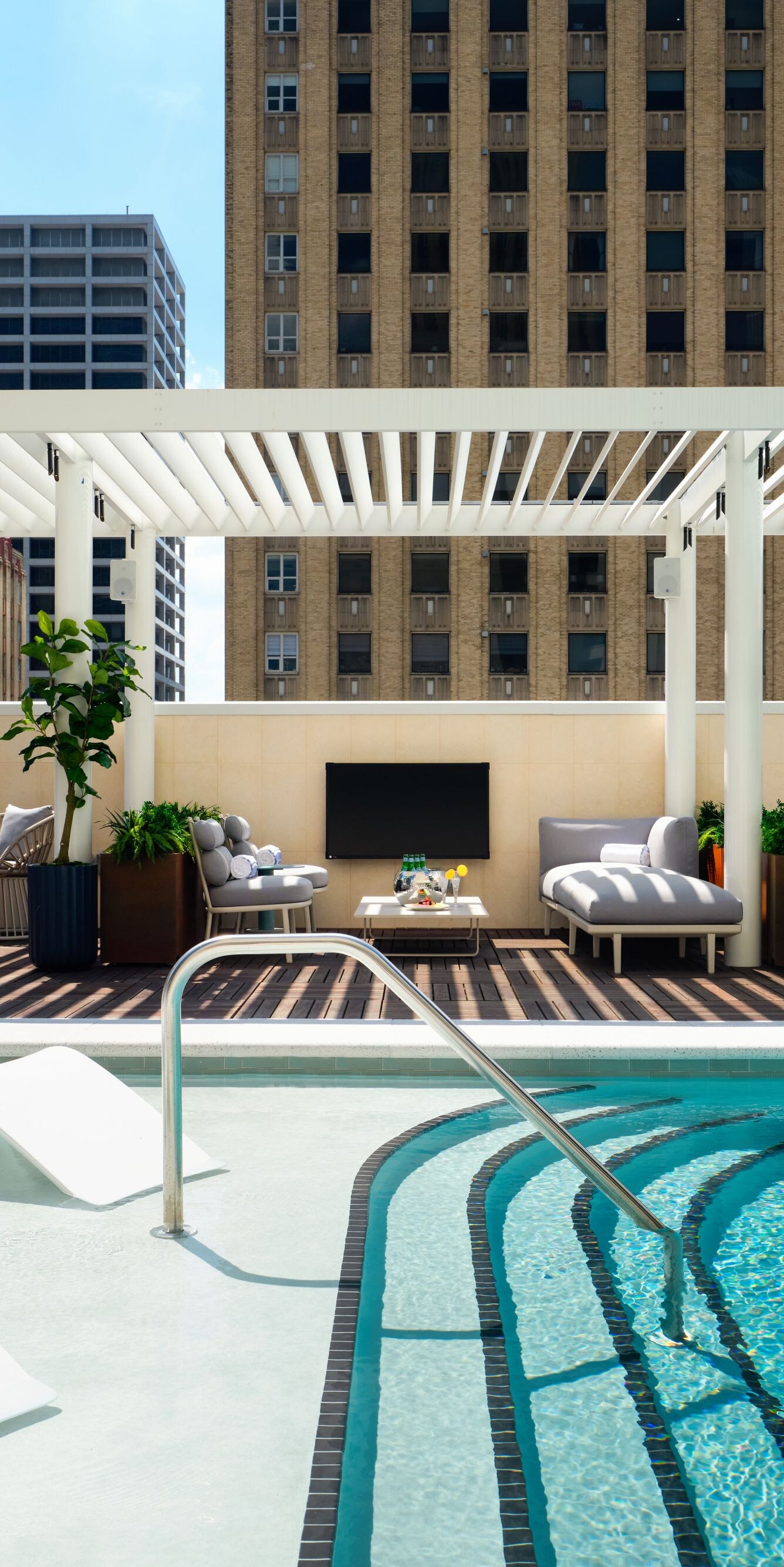 Rooftop pool with city skyline view