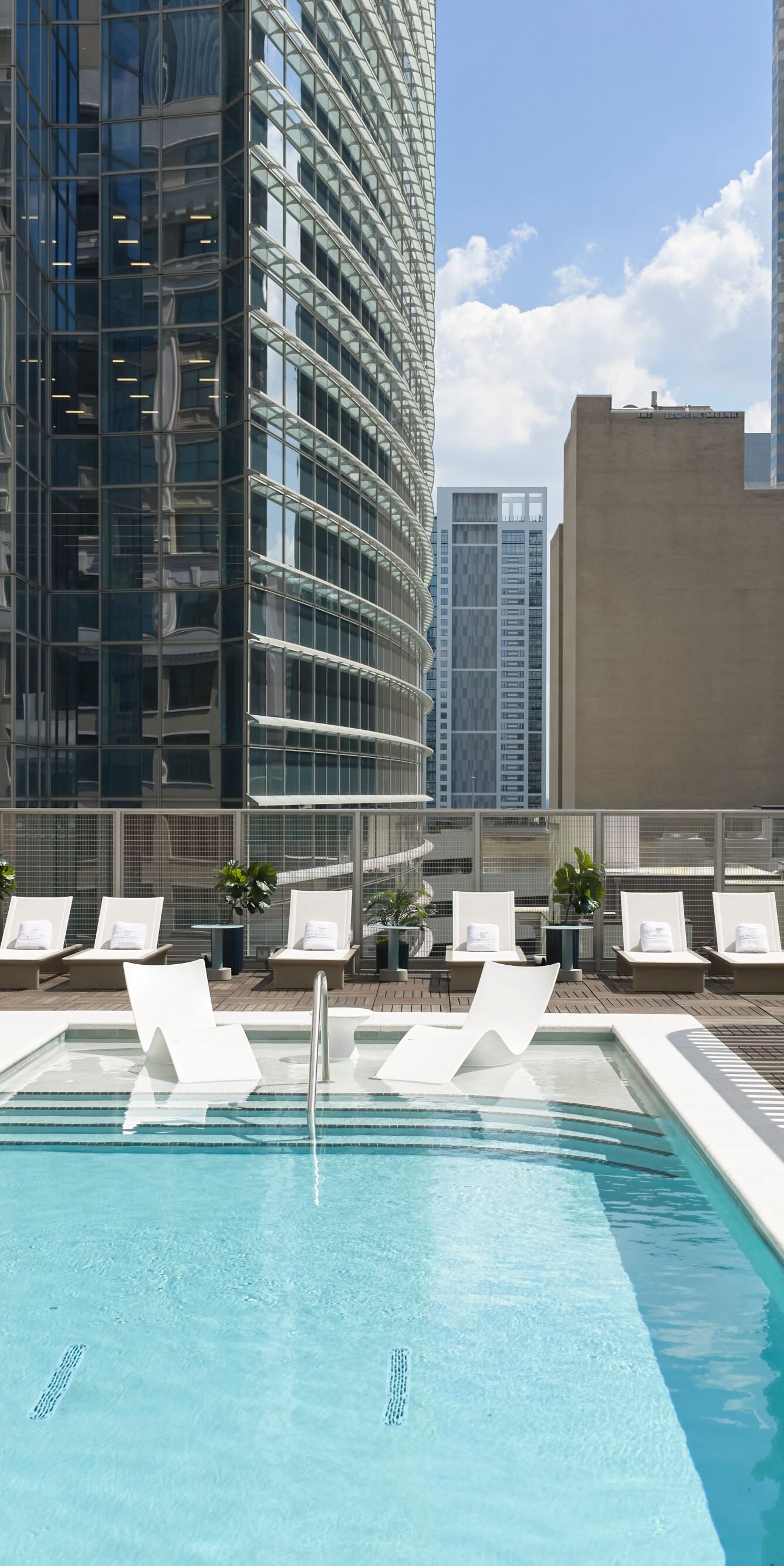 Rooftop pool with city skyline view