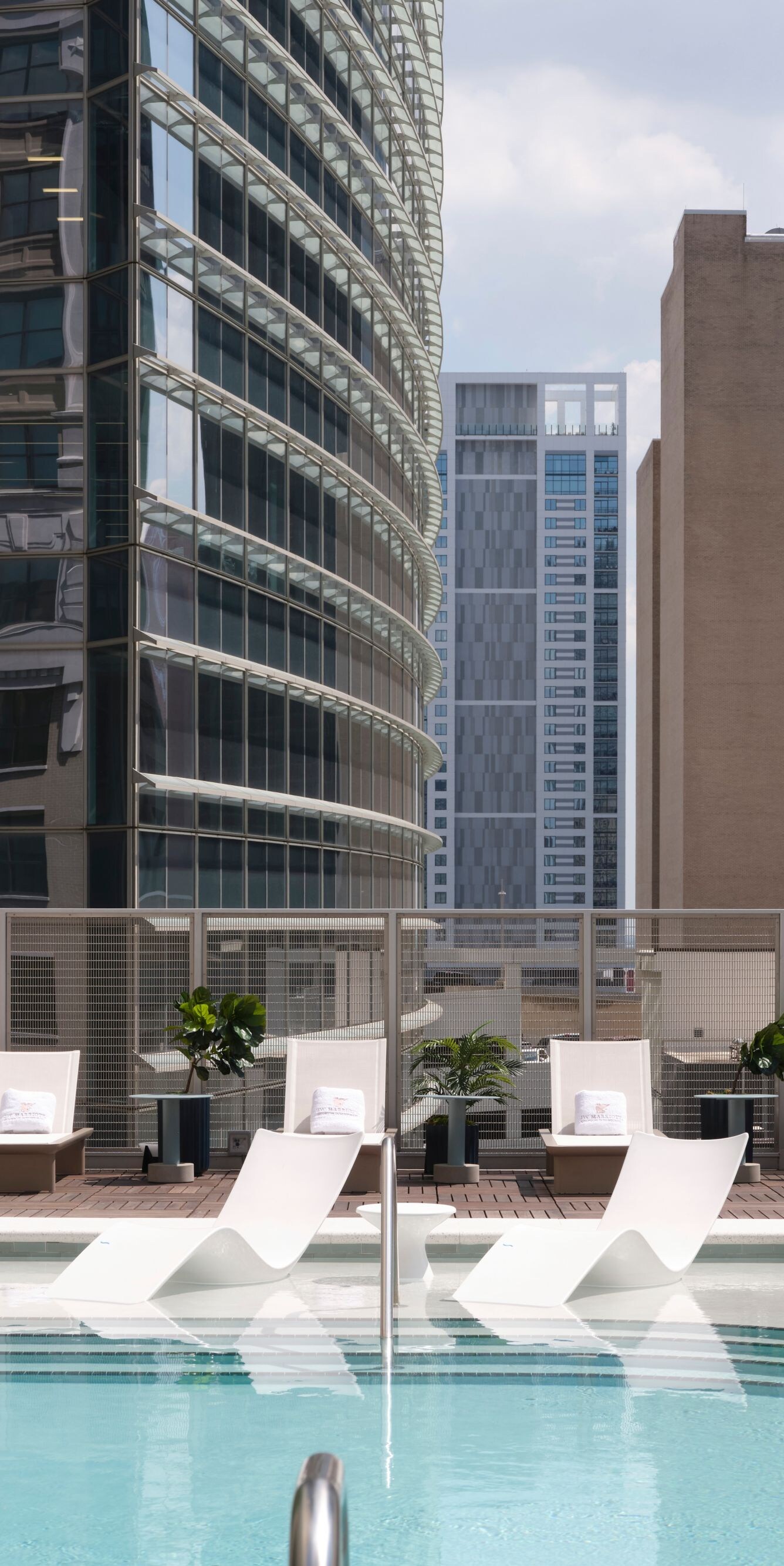 Rooftop pool with city skyline view