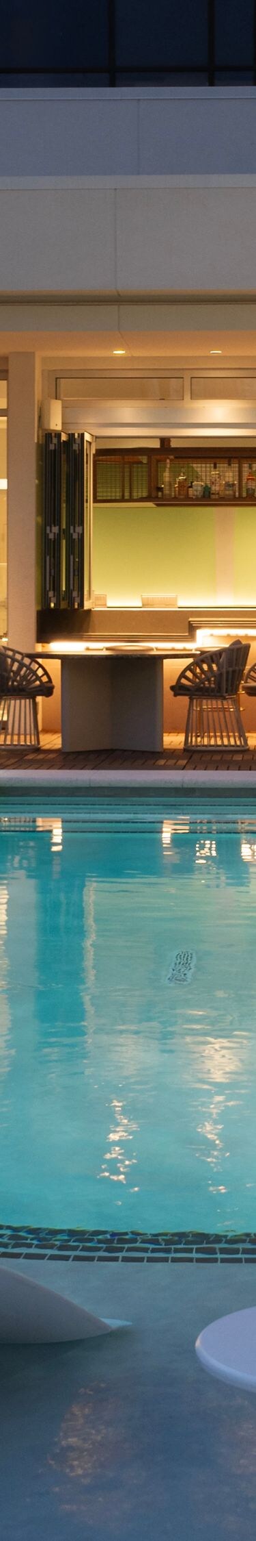 Rooftop pool with city views and bar