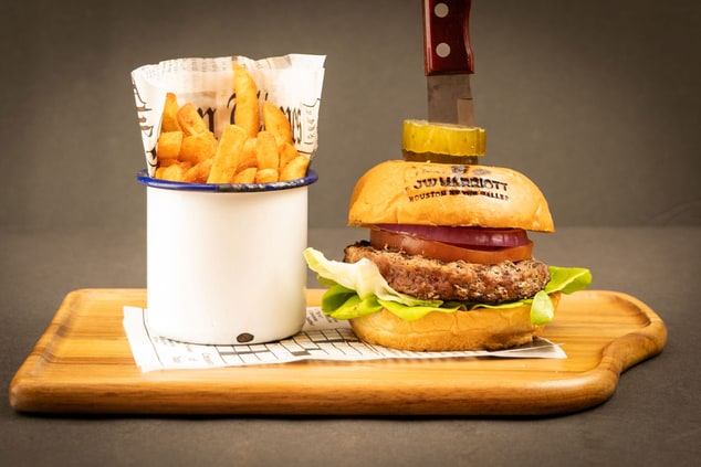 Burger and Fries on a wooden platter