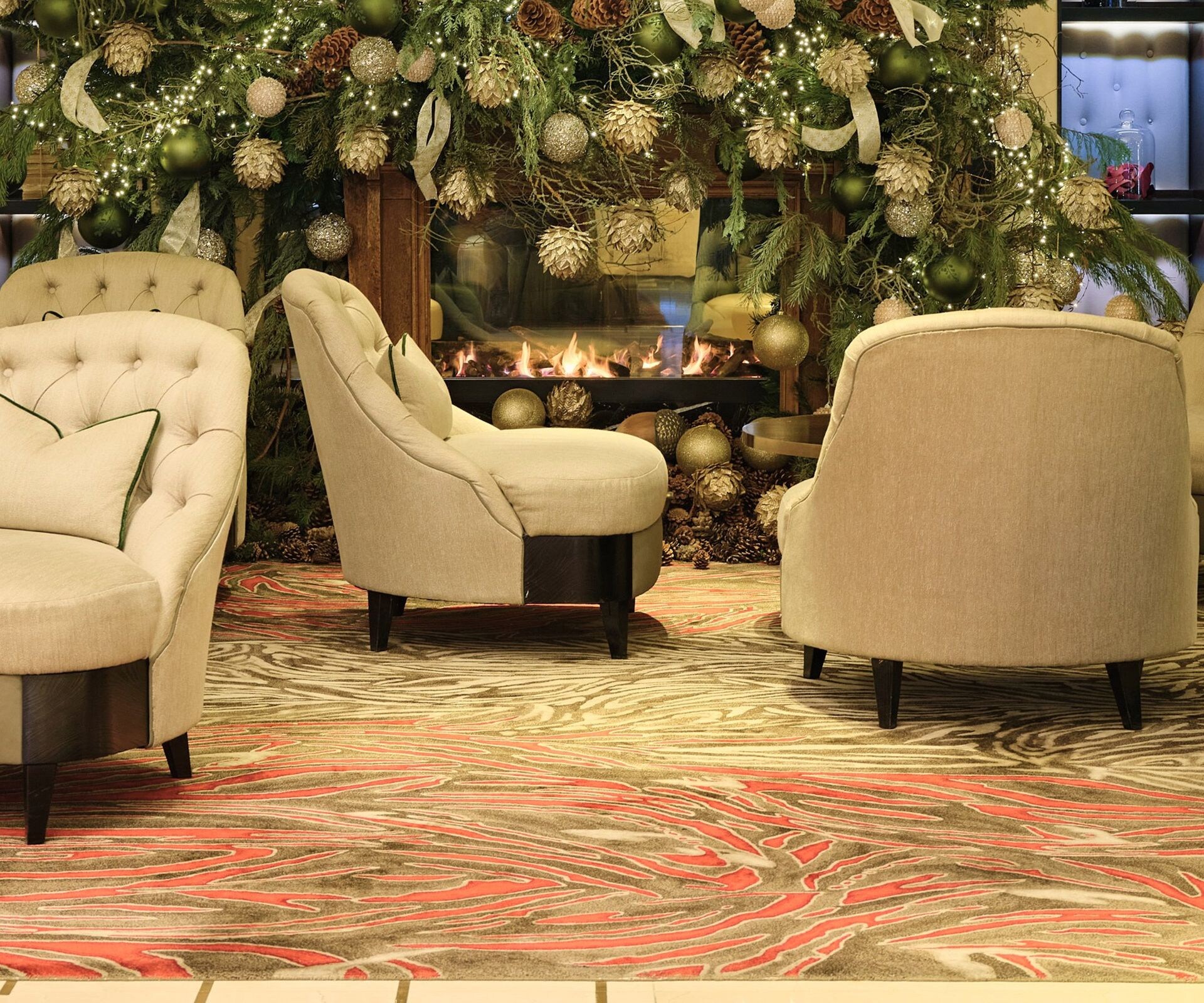 Hotel lobby with Christmas tree and decorations.