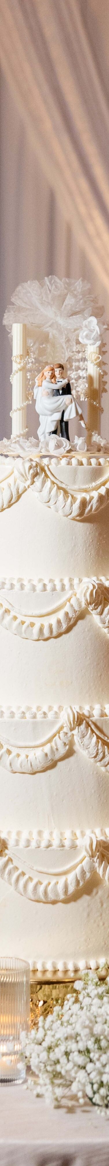 Tiered wedding cake with floral accents