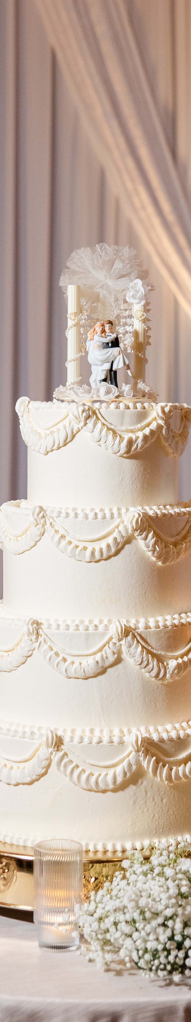 Tiered wedding cake with floral accents