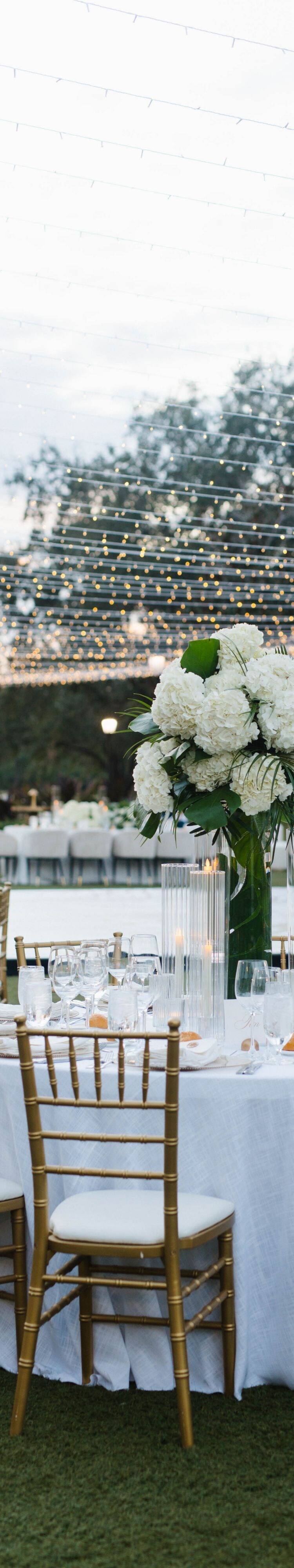 Outdoor reception tables beside water