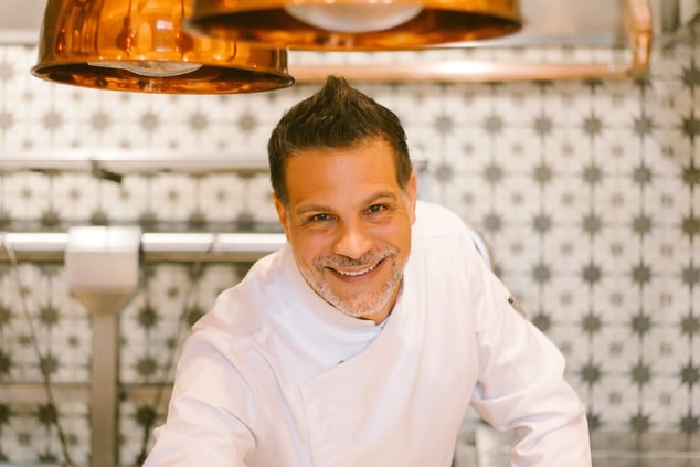 Chef Angelo Sosa smiling at camera