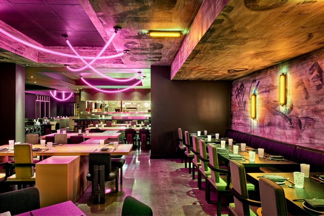 Dining tables and chairs with pink neon lights