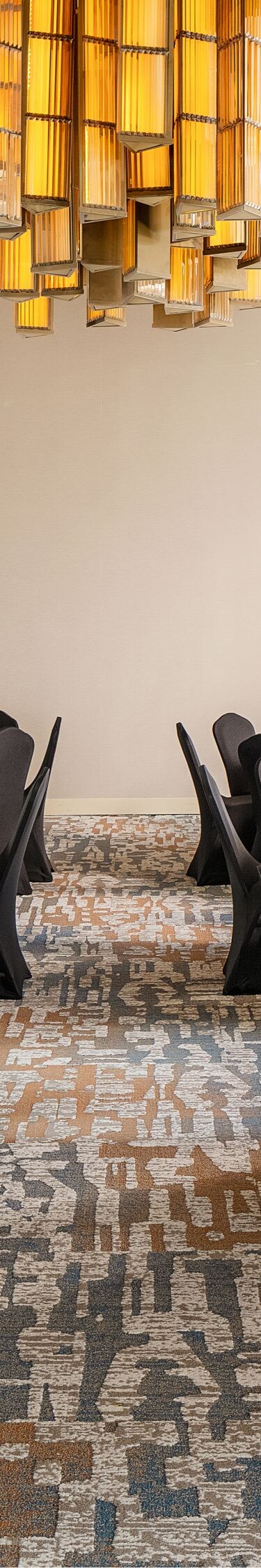 Meeting room set with round tables.