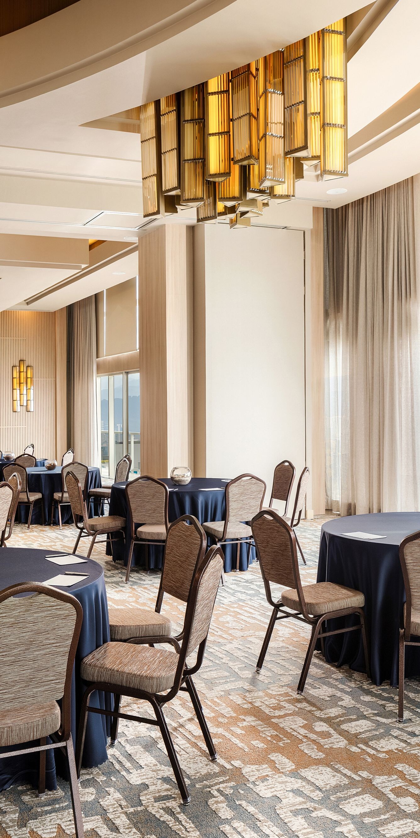 round tables set in a meeting room