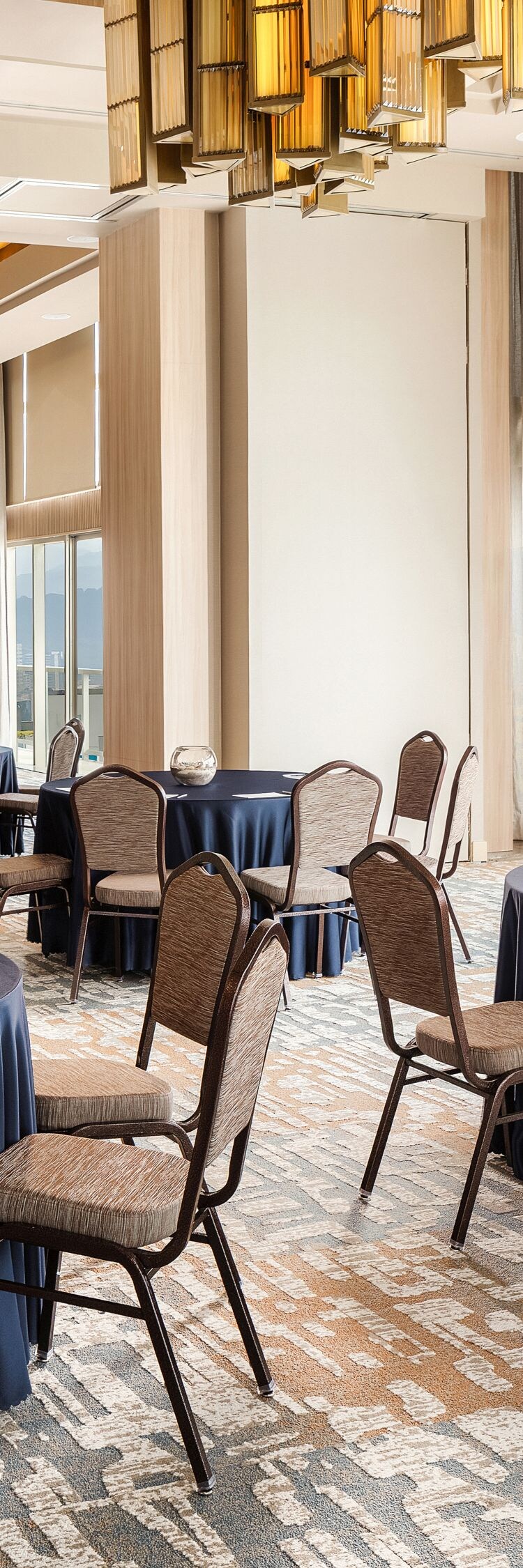 round tables set in a meeting room