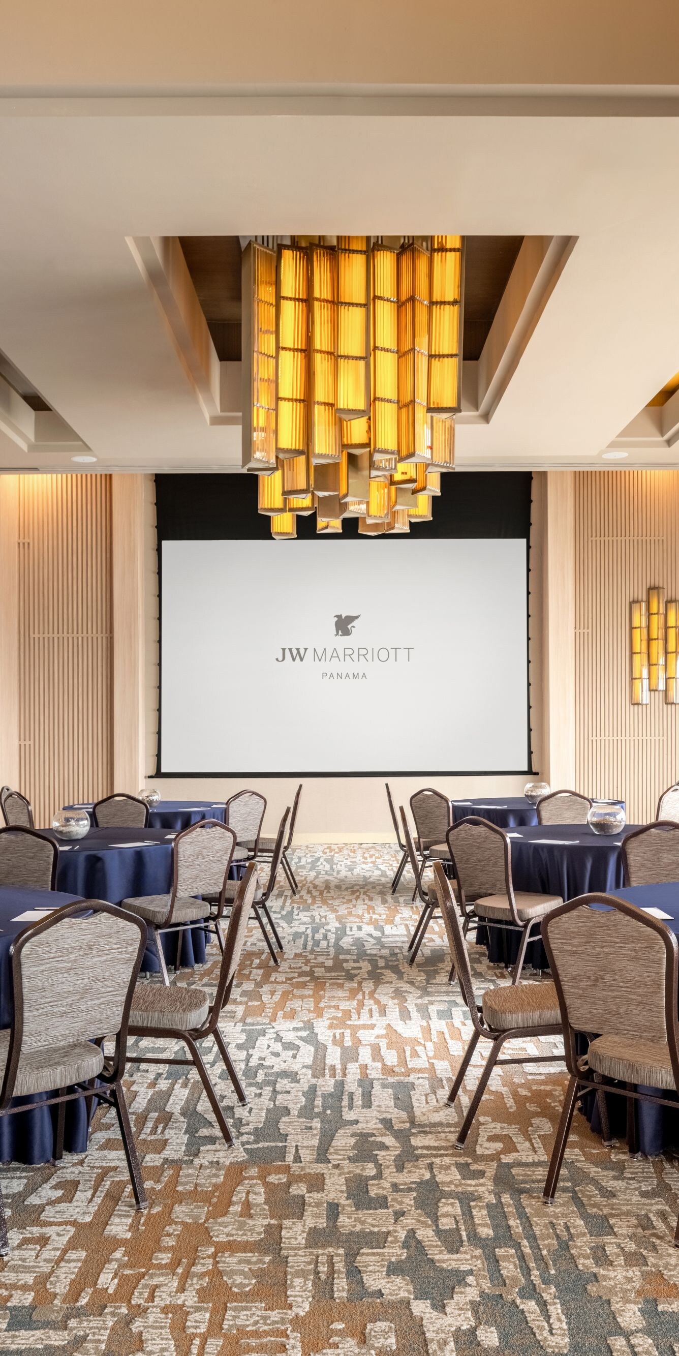 Ballroom set with round tables.