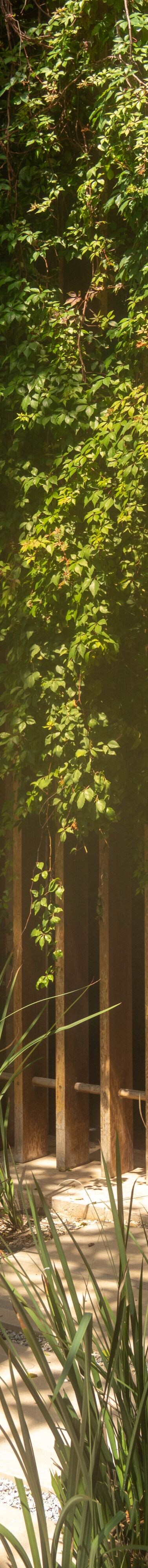 Person in swimwear walking through Jasha Spa.