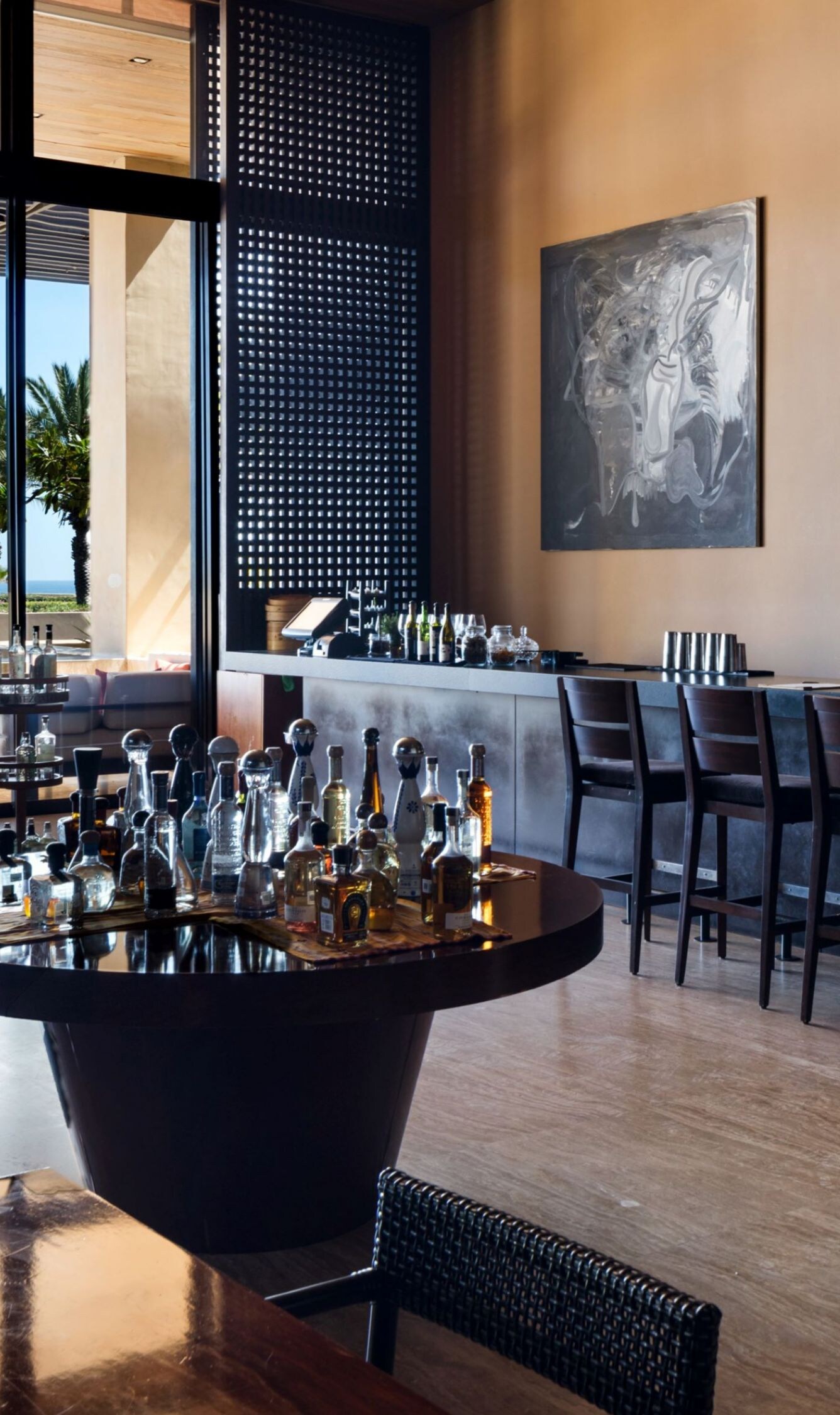 Modern bar with ocean view and seating