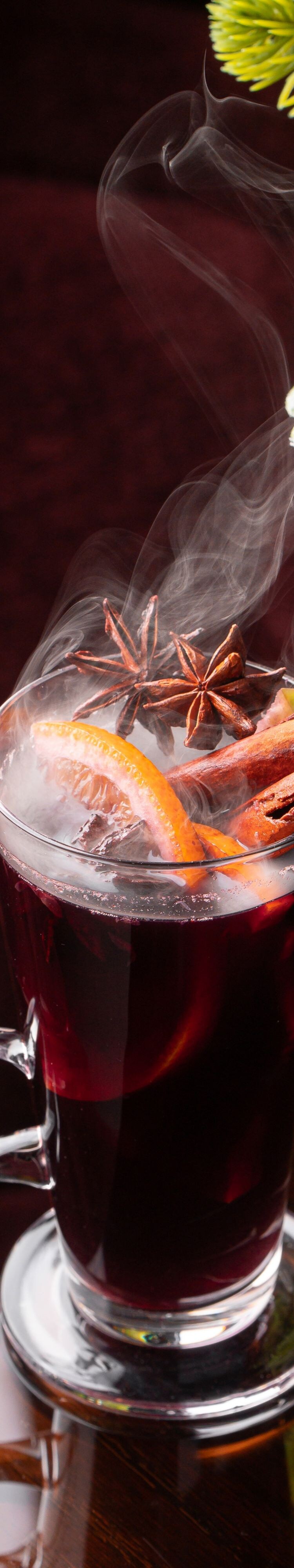 Glass of mulled wine with spices