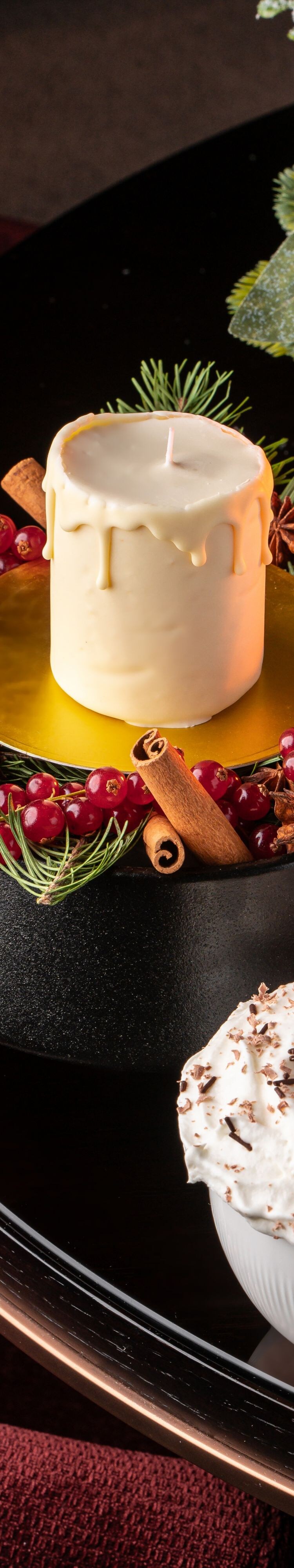 Hot chocolate with candle-shaped dessert