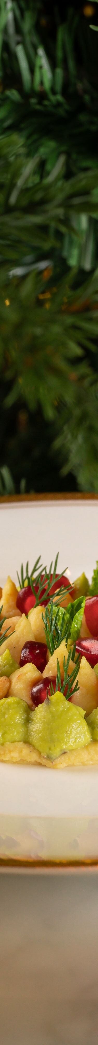 Three hummus varieties with garnishes