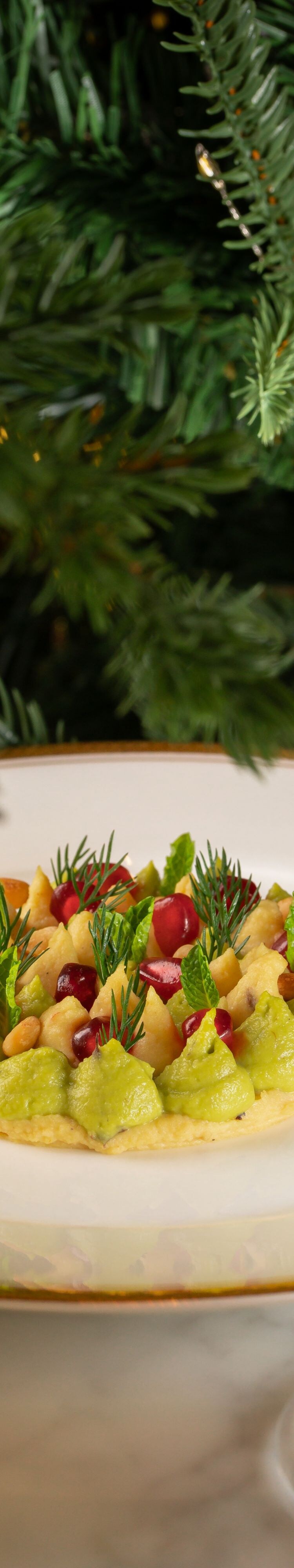 Three hummus varieties with garnishes