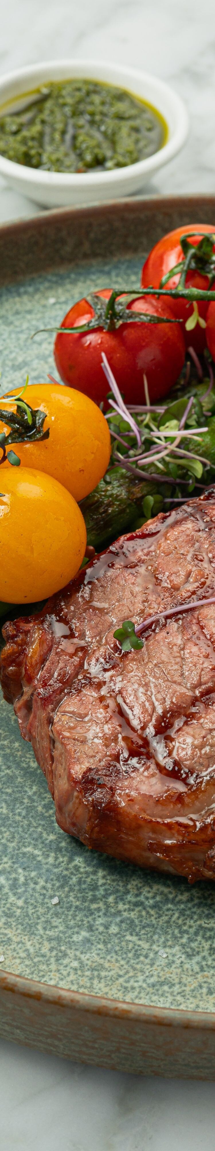 Black Angus ribeye steak on plate