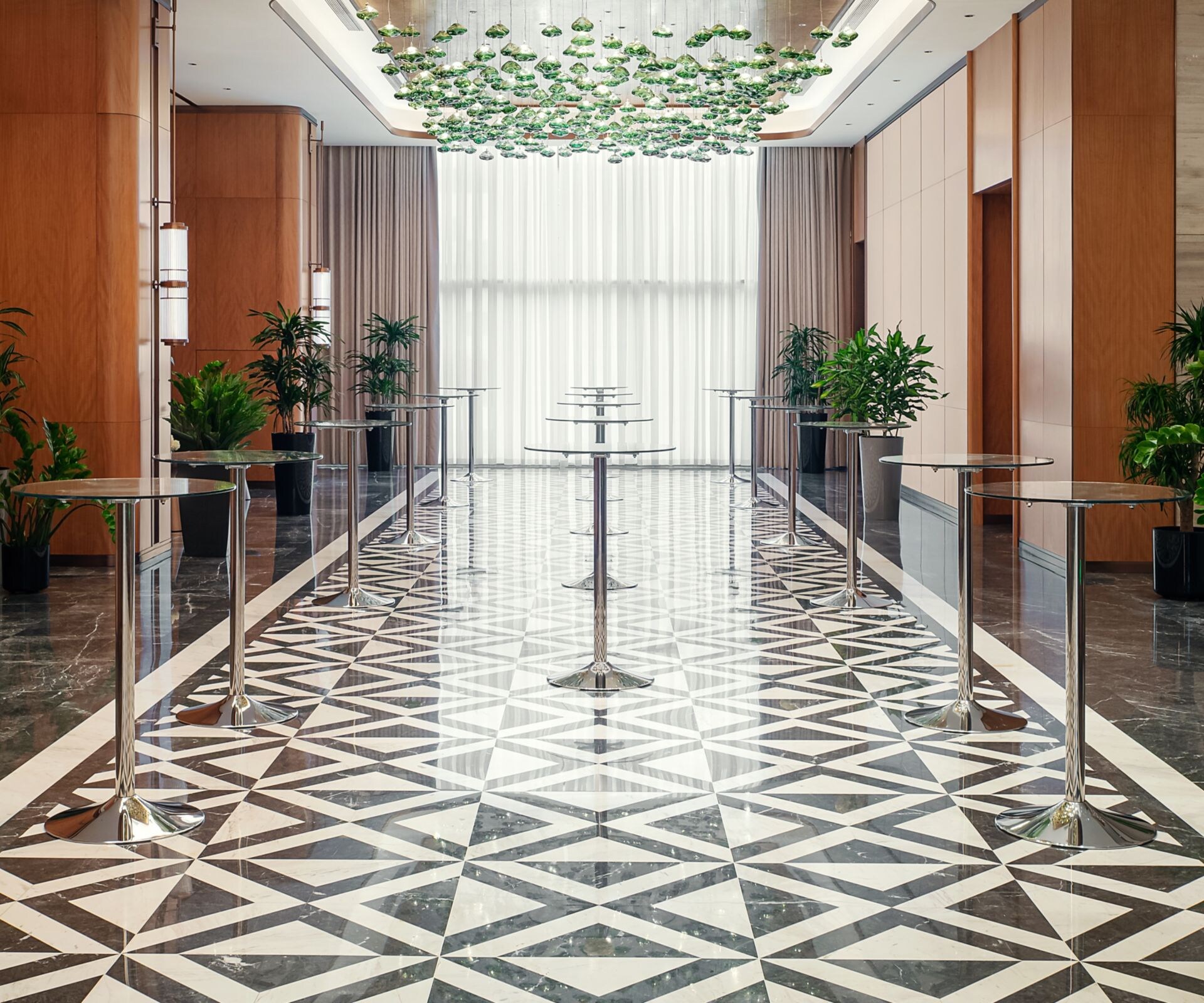 green chandelier, marble floor