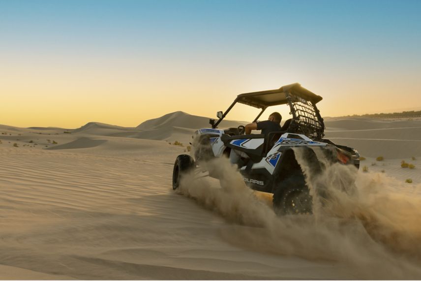 dune buggy desert sunset