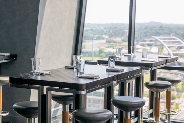 Black high top table at Denim, rooftop bar at The 