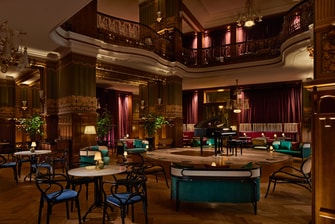 A bar with luxurious interior and royal piano