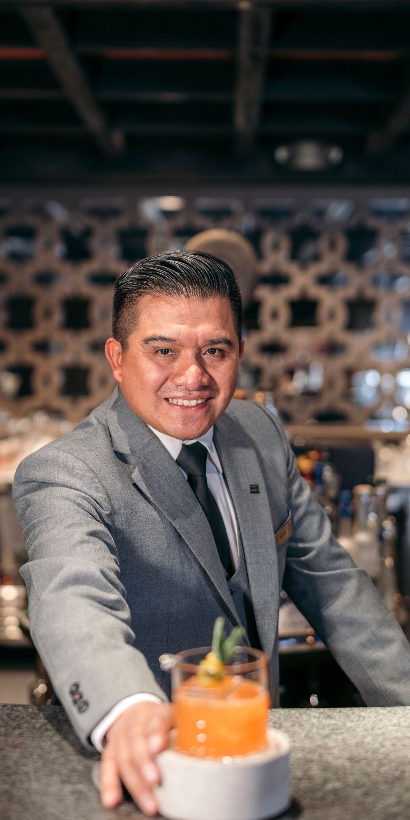 Bartender serving cocktail