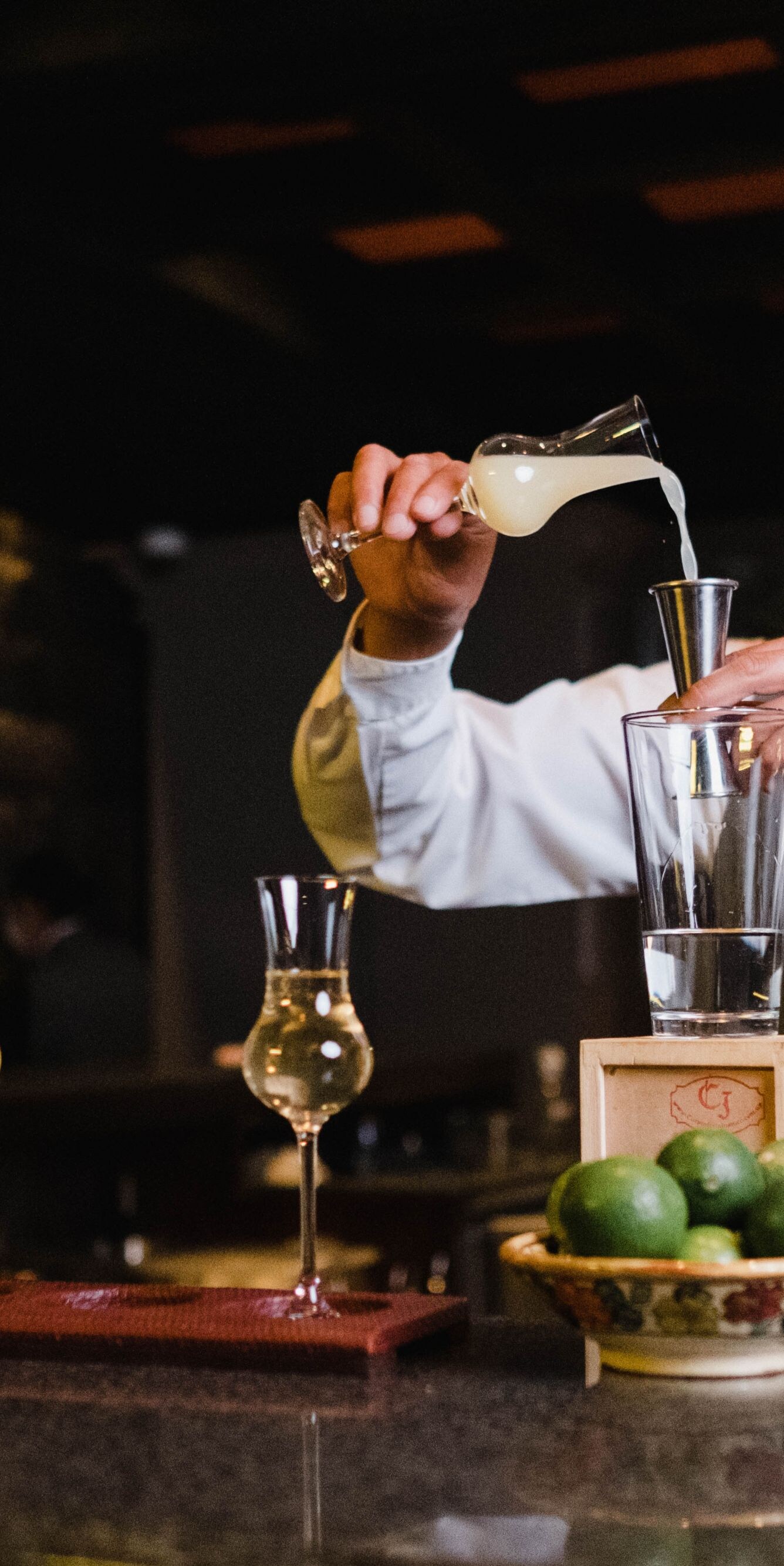 Bartender preparing a Pisco Sour.