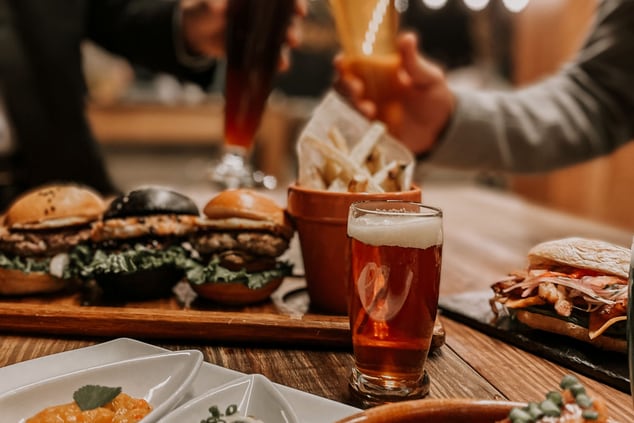 Table with different beers and food