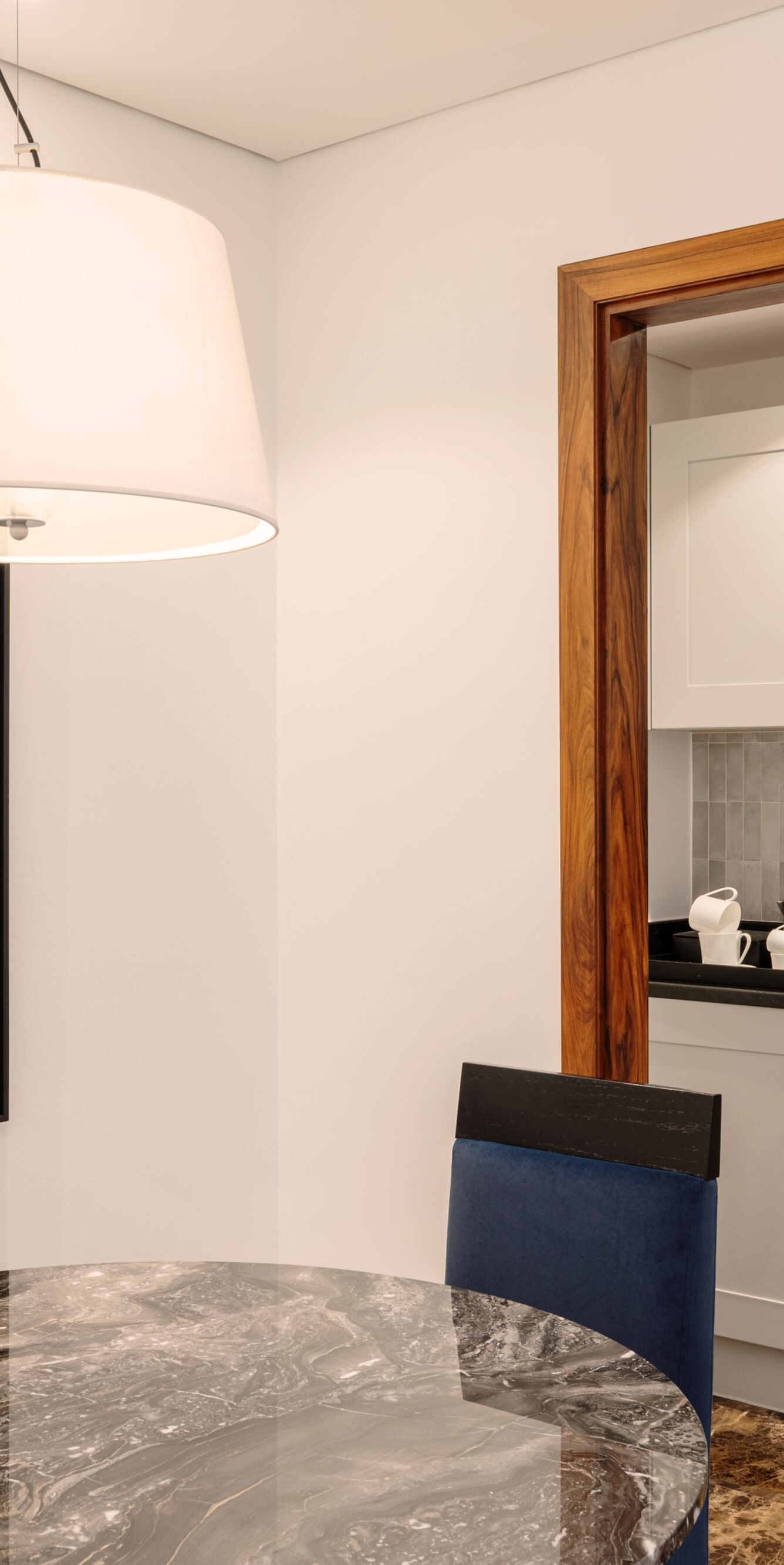 Dining table and chairs with a kitchenette
