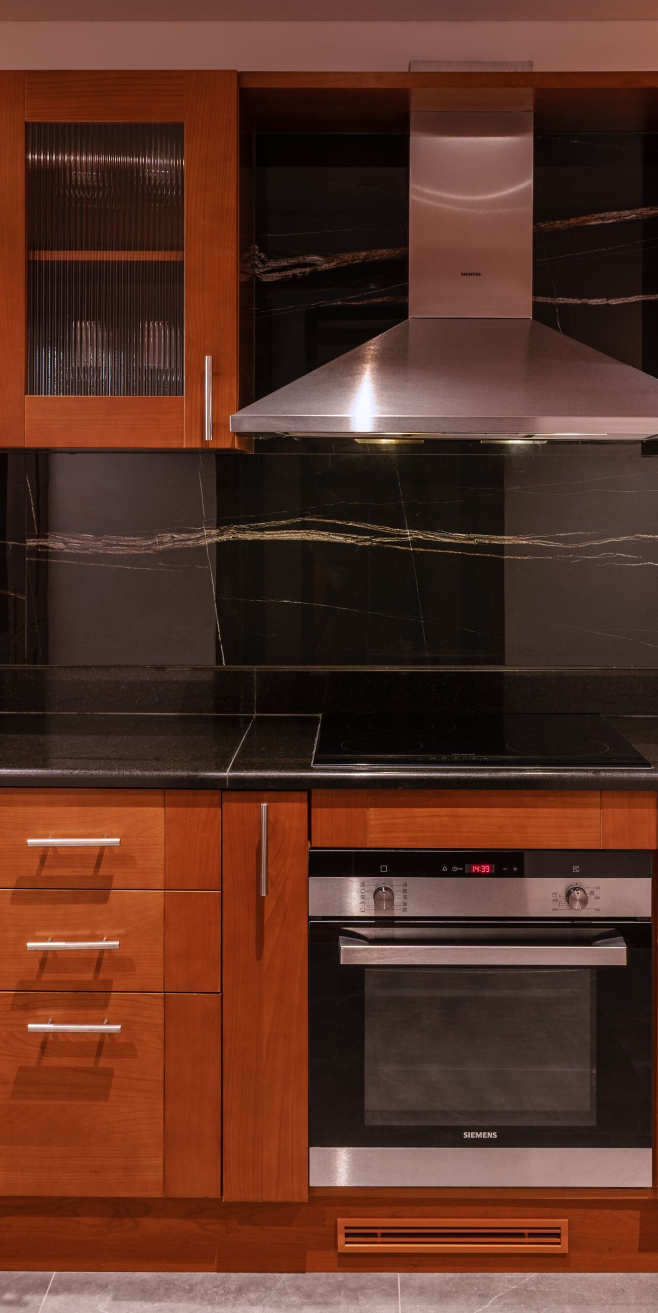 A kitchen in a 1 bedroom suite