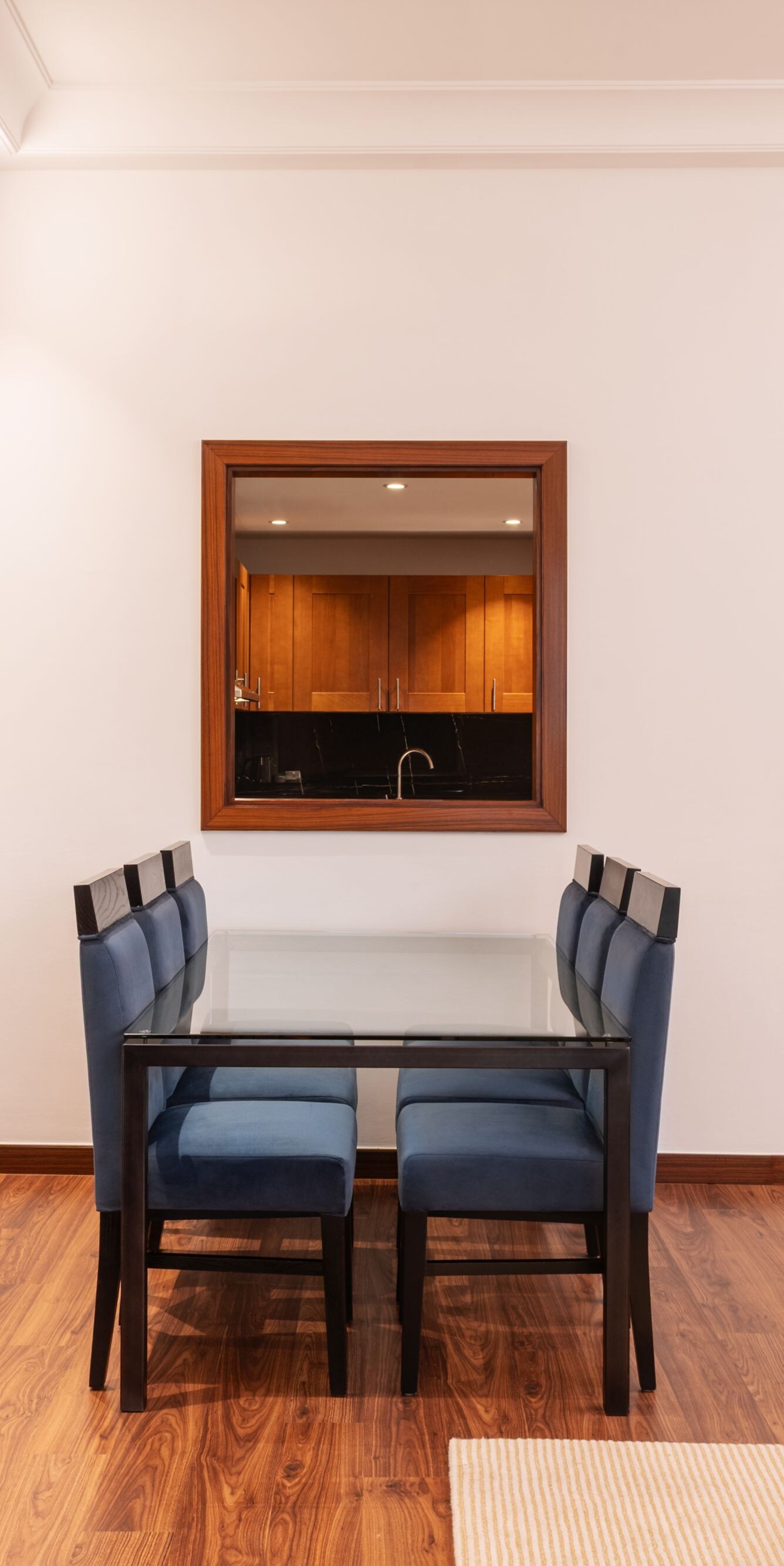 Dining table and chairs in a suite living room
