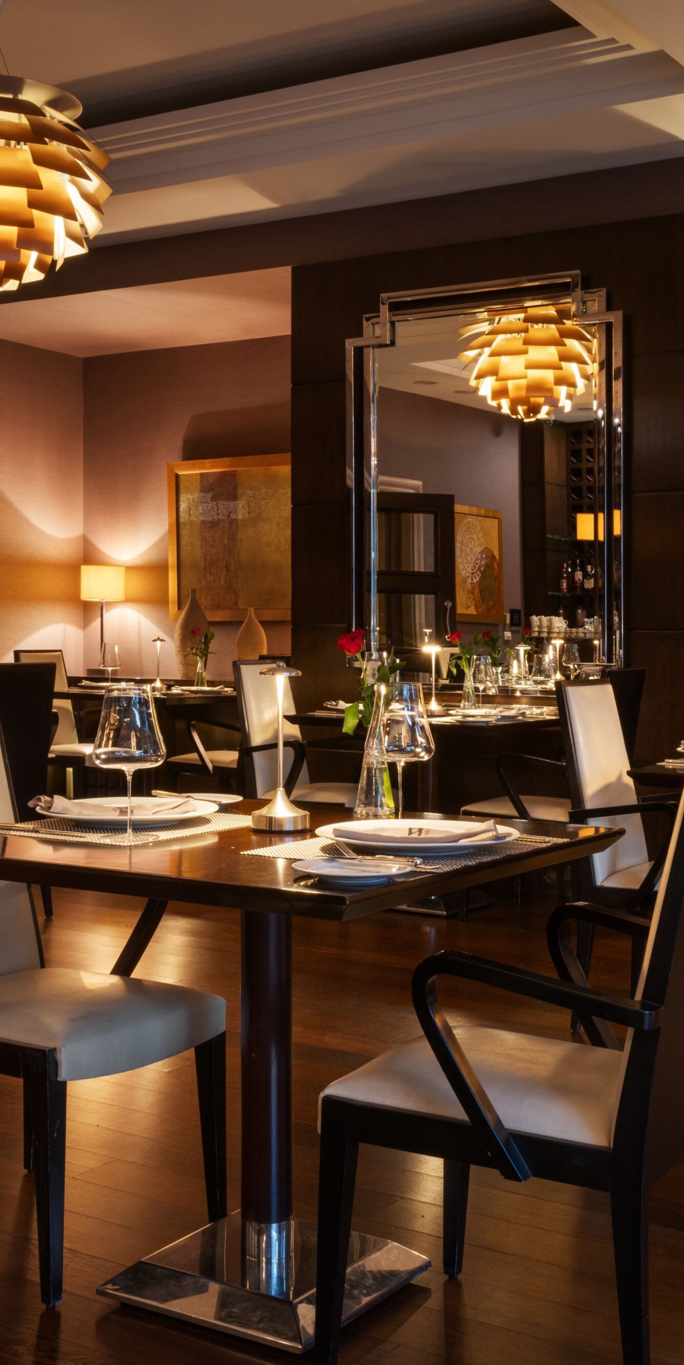 Aruni Restaurant dining area with set tables