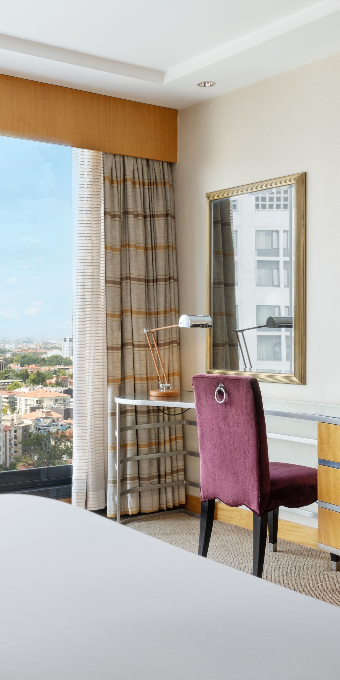 Deluxe King Room workspace overlooking Ankara