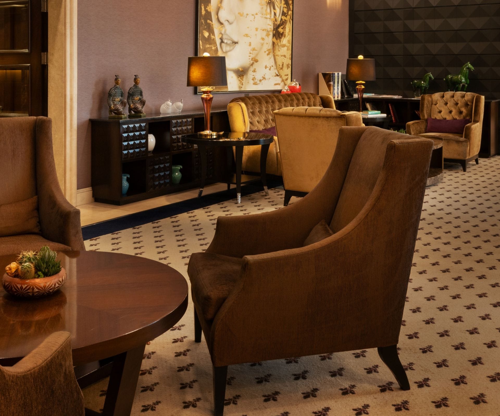 Lobby with seating areas and chandeliers