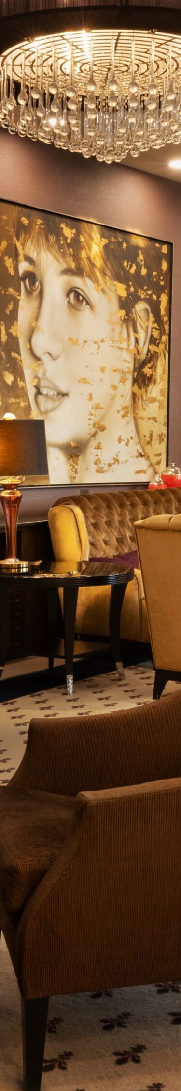 Lobby with seating areas and chandeliers
