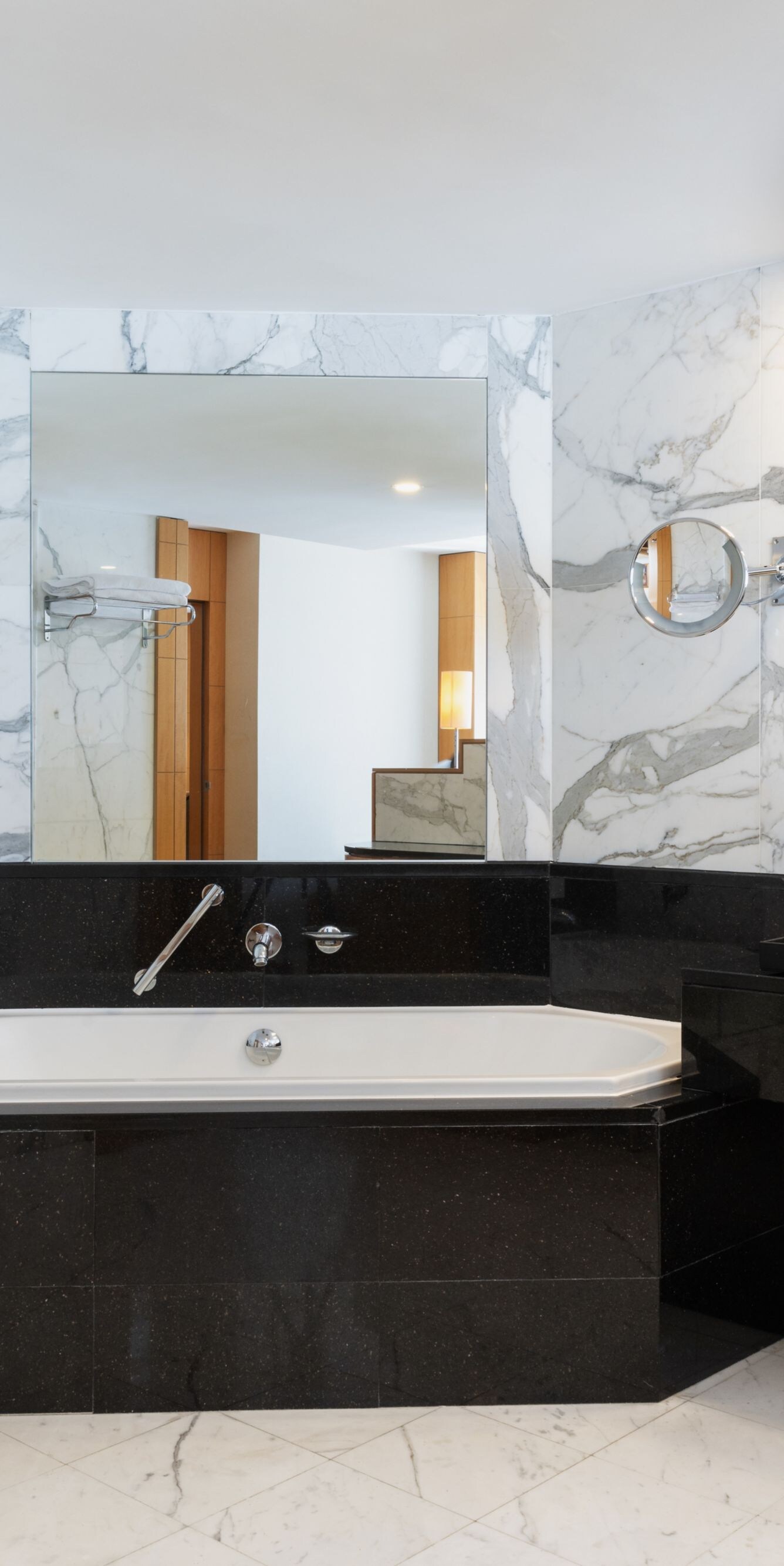 Marble bathroom with bathtub, shower and vanity