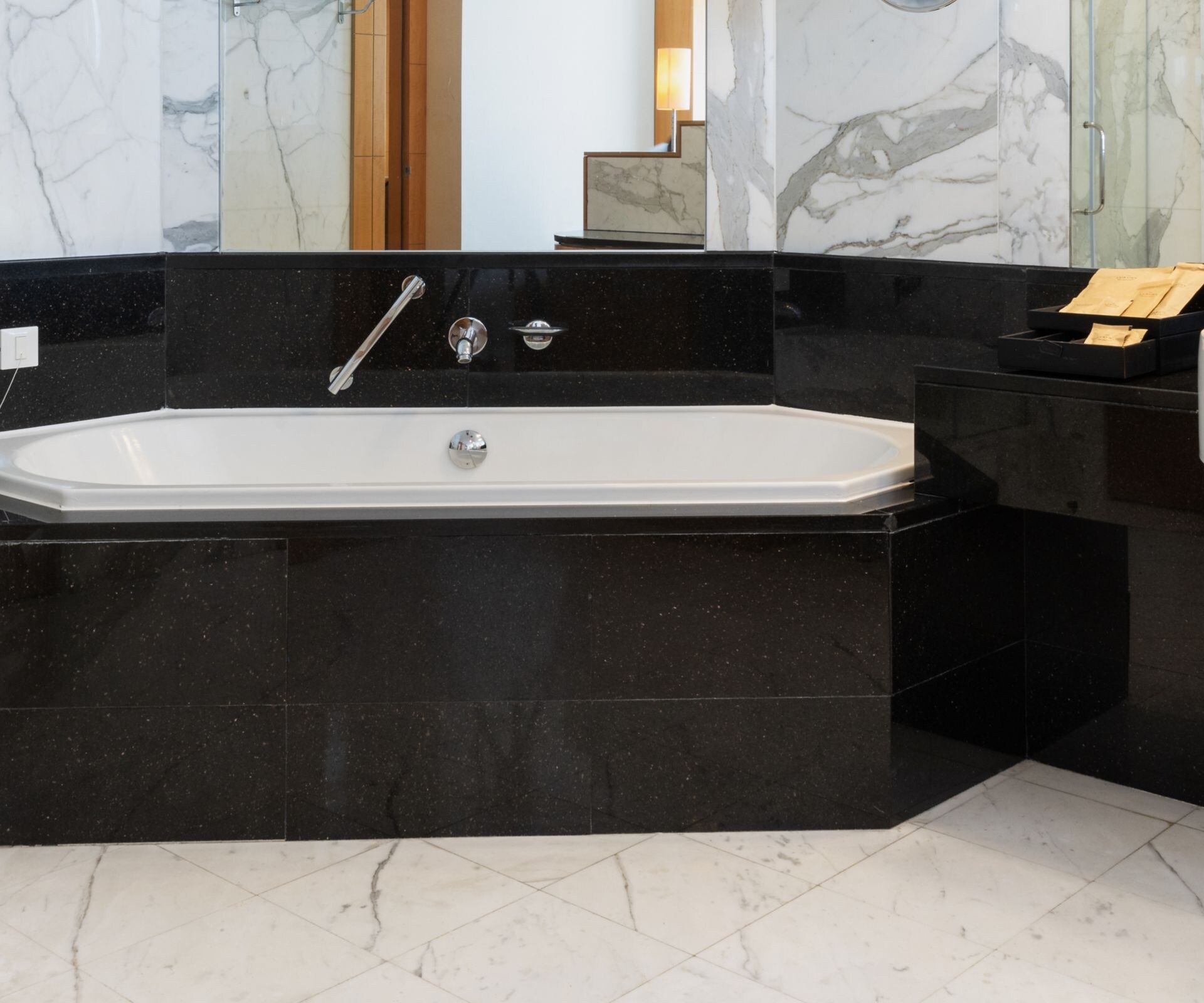 Marble bathroom with bathtub, shower and vanity