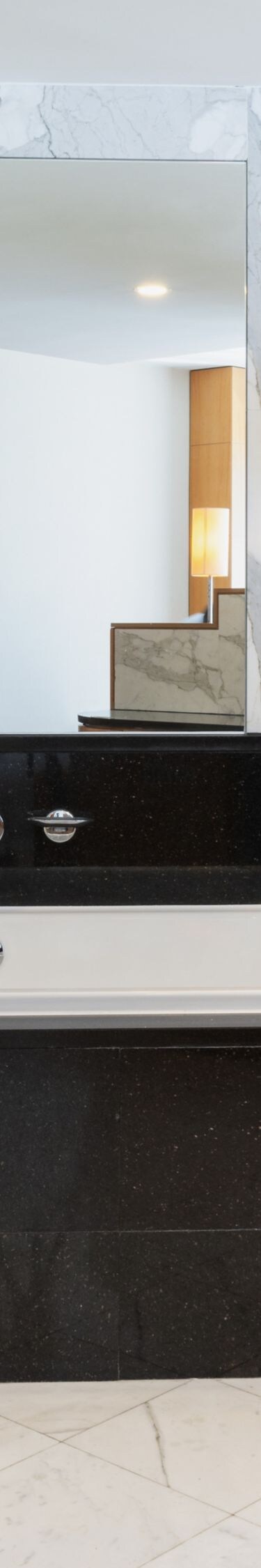 Marble bathroom with bathtub, shower and vanity