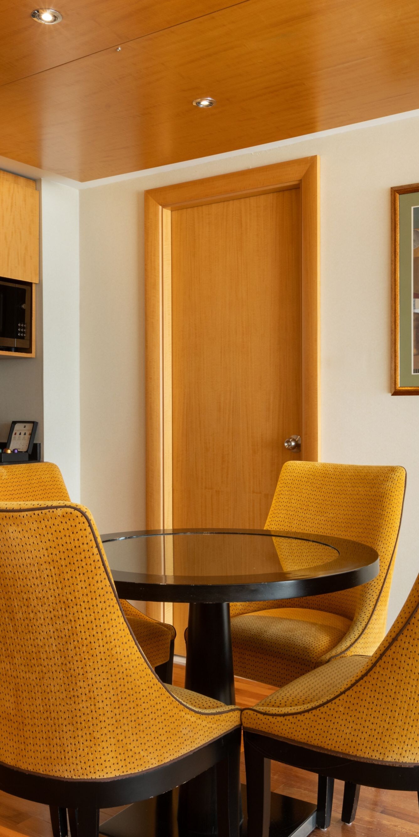 Dining area with kitchenette and four-seat table