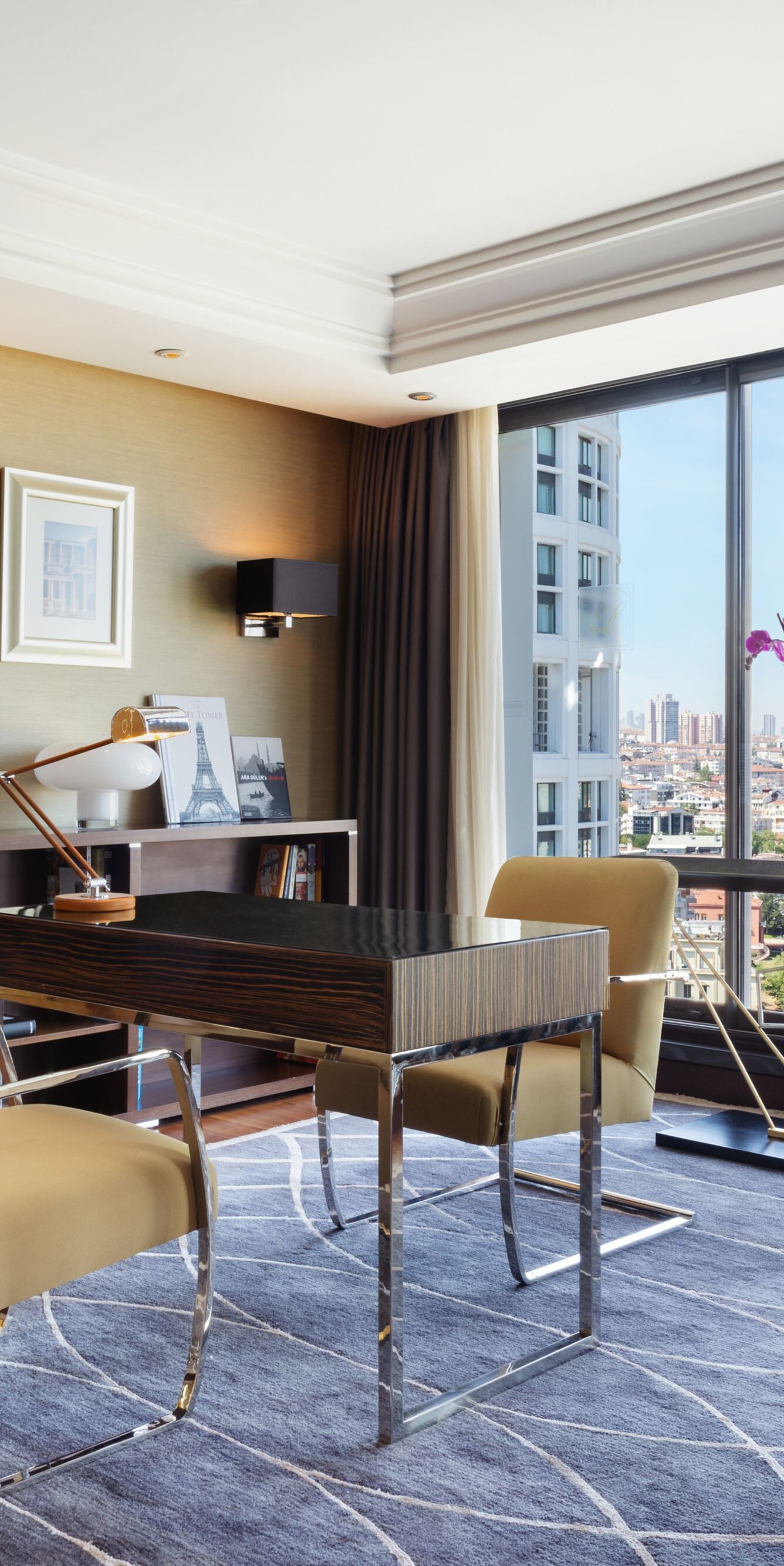 Lugal workspace with desk and panoramic city view