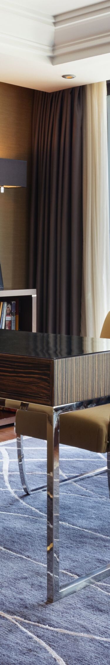 Lugal workspace with desk and panoramic city view