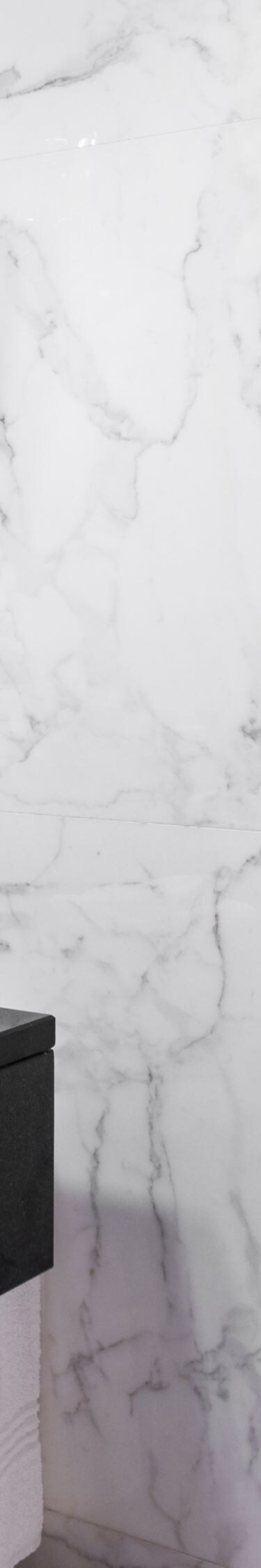 Marble bathroom with vanity, tub and shower