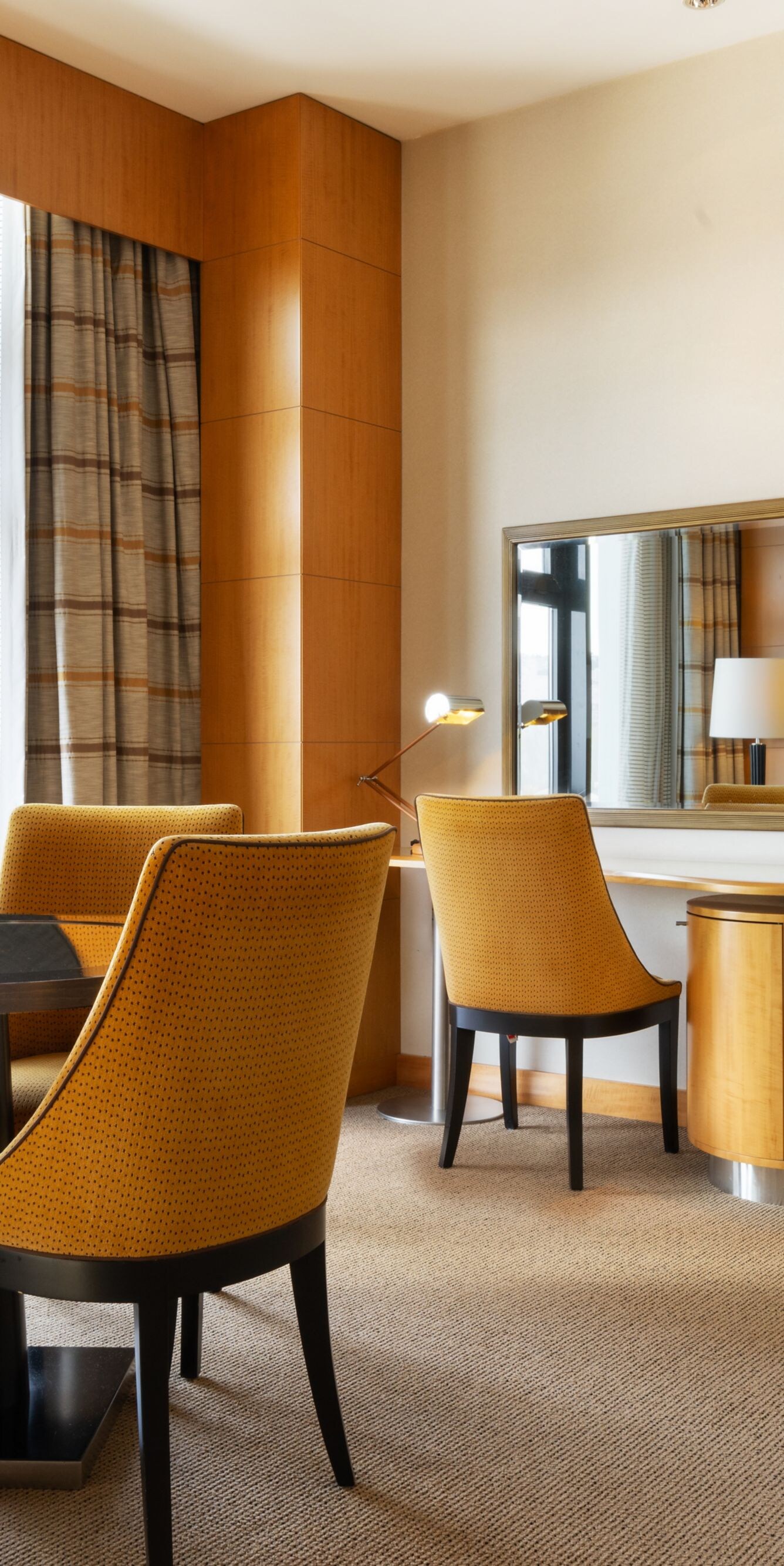 Dining area with four-seat table and city view