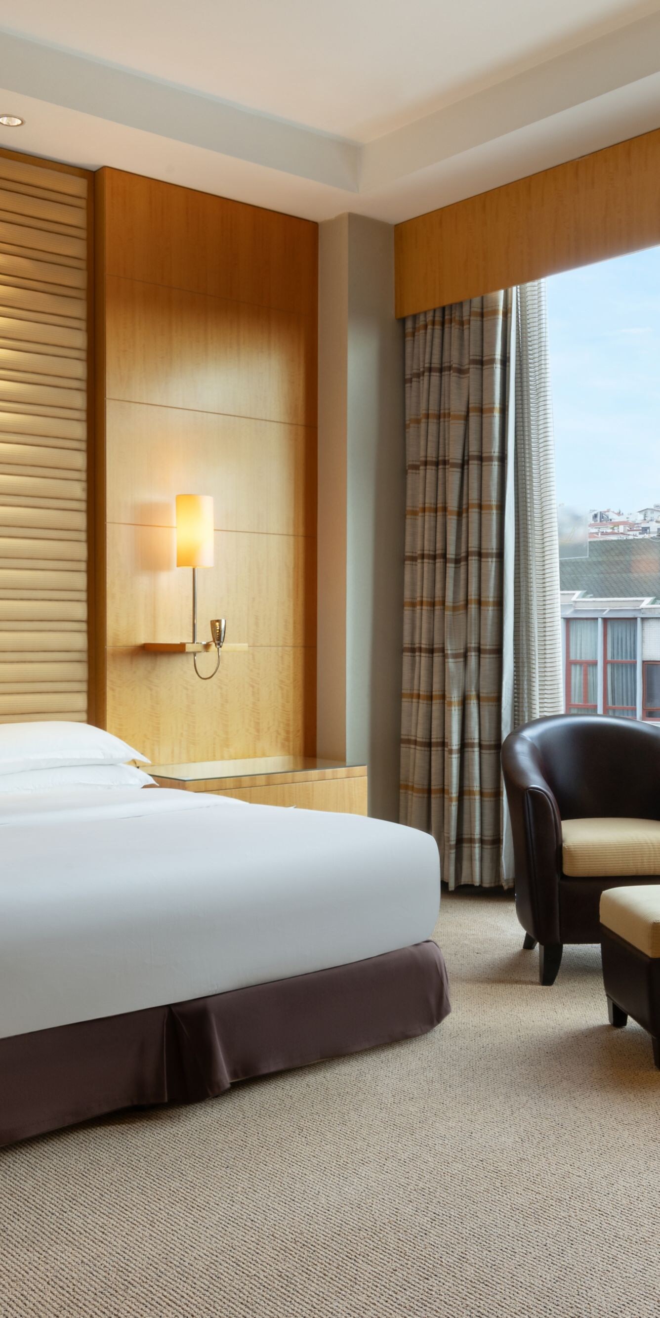 Two Bedroom Suite king bed with large windows