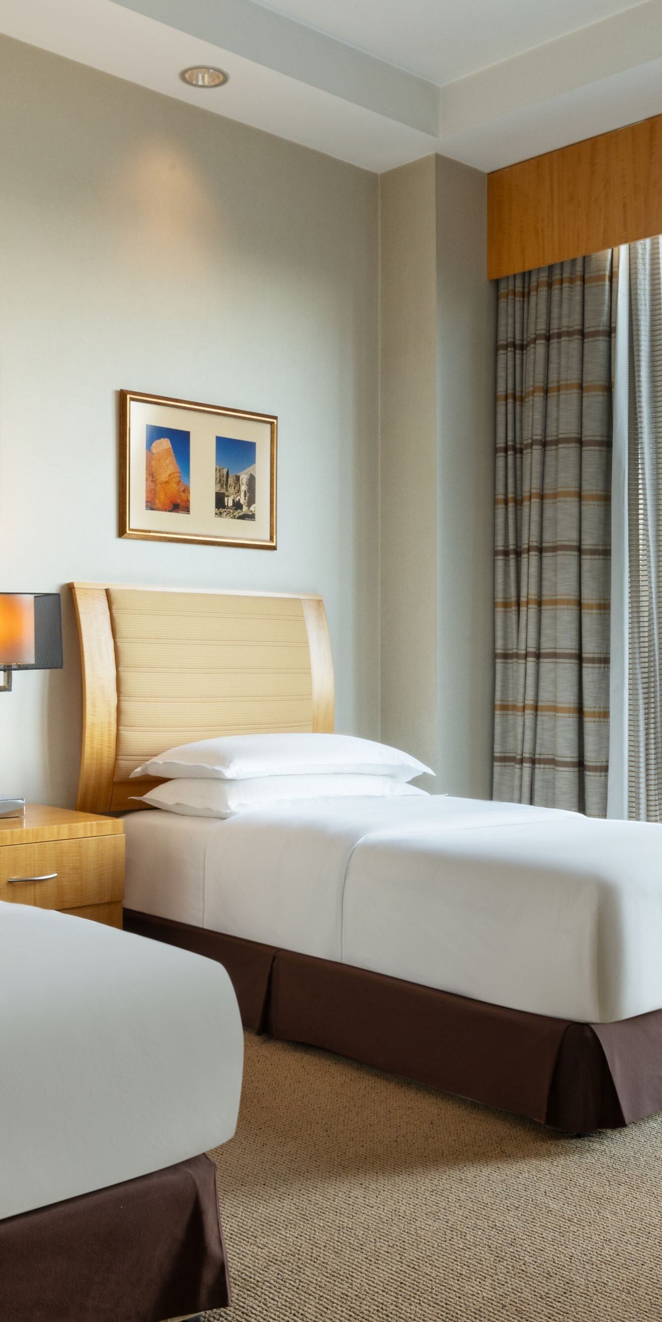 Two Bedroom Suite twin beds with large windows