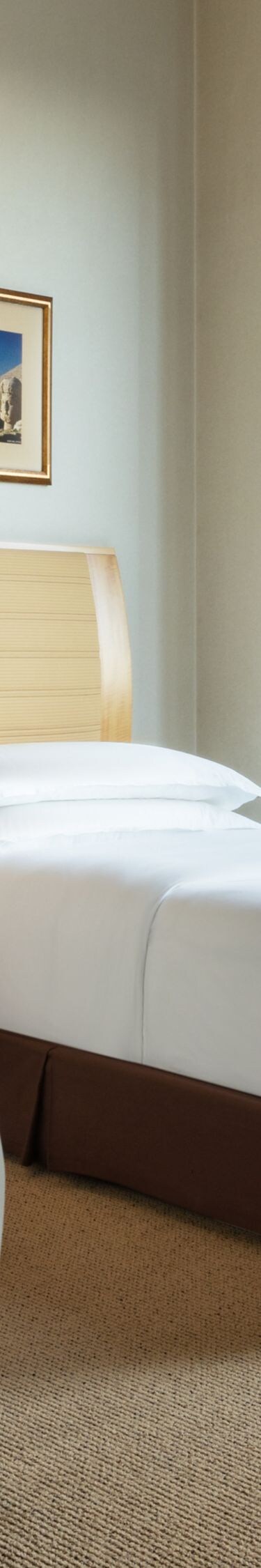 Two Bedroom Suite twin beds with large windows